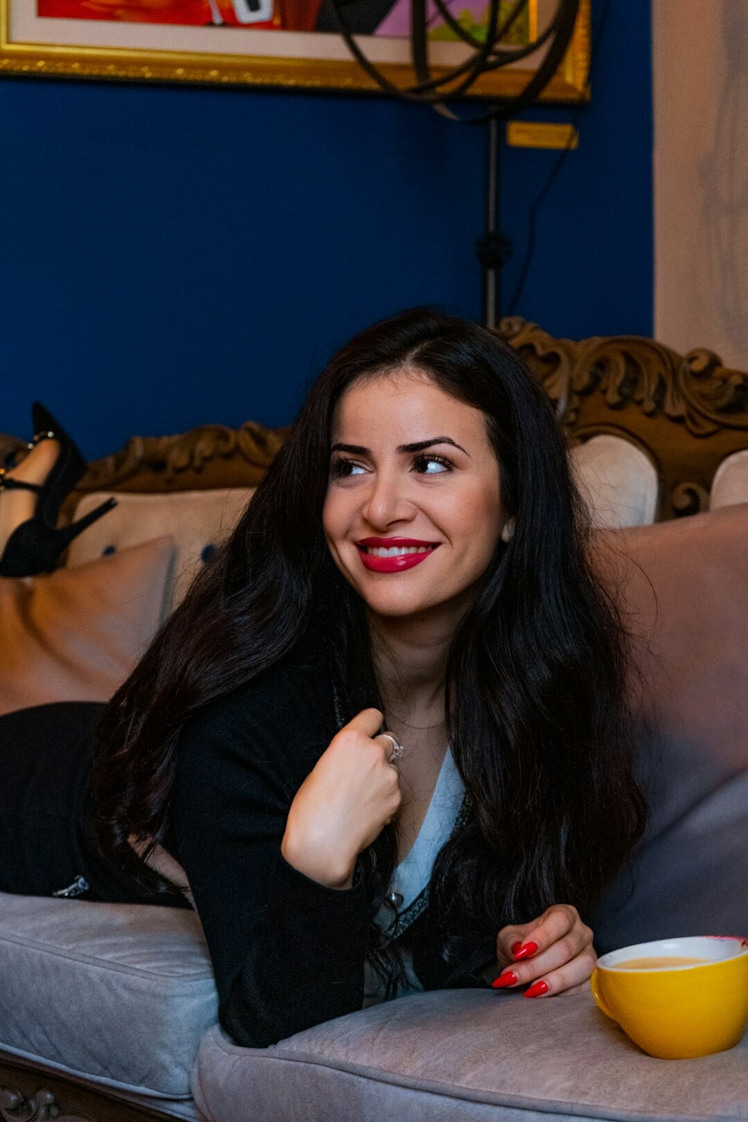 Studio portrait of a warm European female talk show host