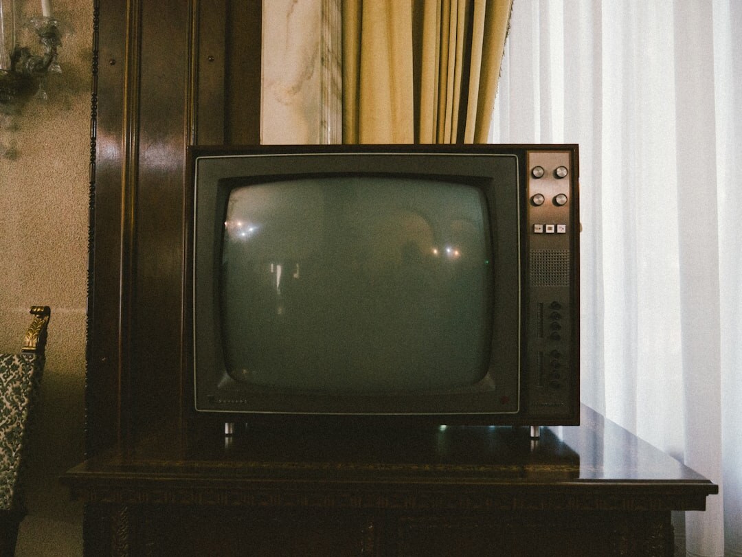 family watching vintage television