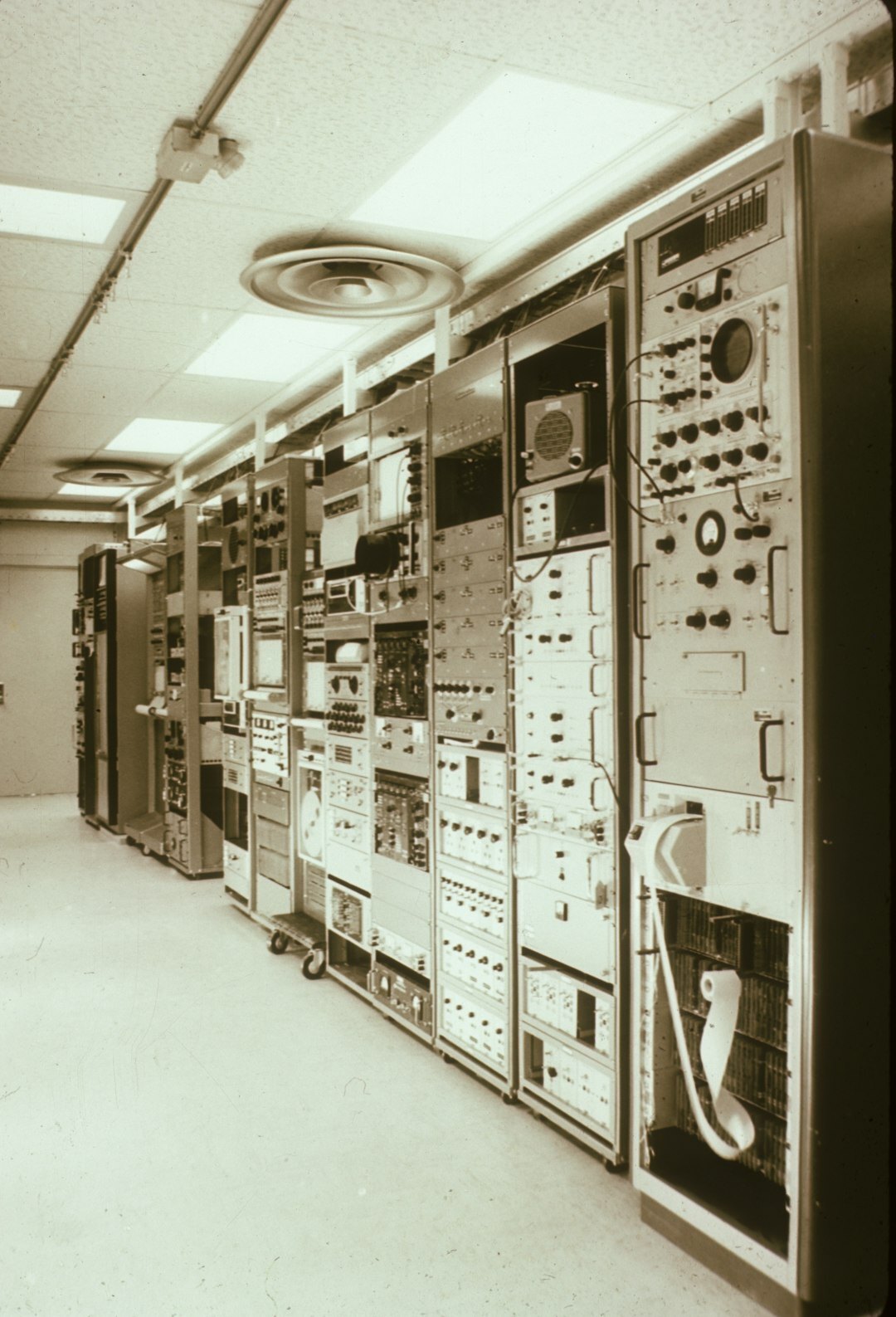 Archive photograph of an old European broadcast control room with analog equipment